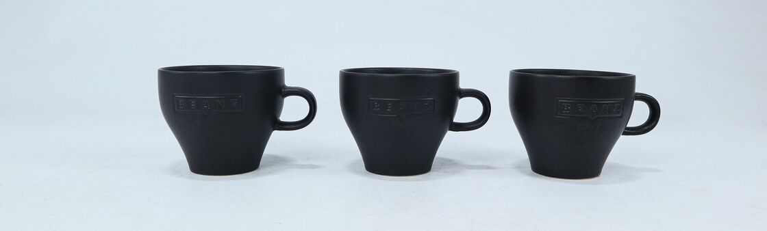 Matte Black Embossed BEANZ Cafe Ceramic Coffee Mugs, Curved Wide Body Minimalist Café Style Mug Set